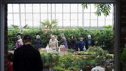 Guest tour the South Conservatory garden railroad, which shows plants arriving at Phipps from the Columbian Exposition  of 1893 in Chicago.