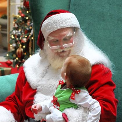 Santa Claus says this time of year everybody, down to the littlest ones, are dressed up for the holidays.