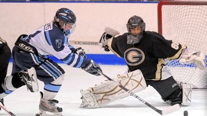 Bishop Canevin's Blaine Adams fires a shot at Gateway goalie Tyler Perhac during a PIHL Class AA game last season.