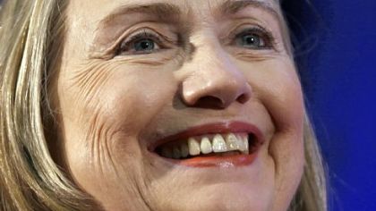 Secretary of State Hillary Rodham Clinton smiles as she waits to speak at Singapore Management University in Singapore last Saturday.
