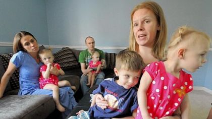 The Johnson family of Hempfield faces an uncertain future with all four of their children diagnosed with ataxia-telangiectasia, also known as Louis-Bar syndrome. From left: health aide Haley Banusick with Riley, 2; dad Ryan with Payton, 2; mom Addison with Ayden, 5, and Alivia, 2.
