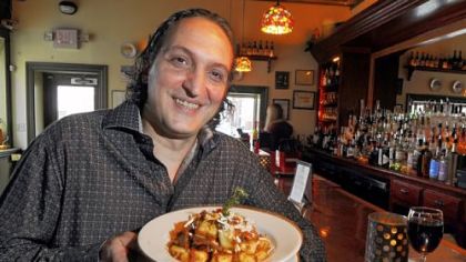Michele Savoia, owner of Dish Osteria and Bar, South Side, with gnocchi al ragu di cinghiale (gnocchi with wild boar).