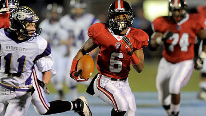 Aliquippa's Dravon Henry runs the ball against Karns City Friday night at Central Valley High School.