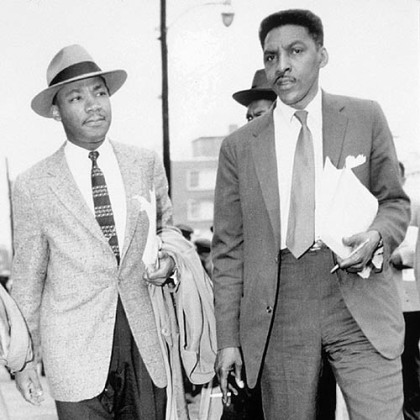 Bayard Rustin, right, walks with Martin Luther King, Jr., in this 1956 file photo.