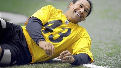 Steelers' Troy Polamalu stretches during practice on the South Side Sept. 26.