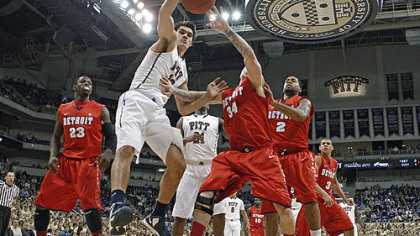 Pittsburgh's Steven Adams (13) goes for a rebound with Detroit's Nick Minnerath (34) in the first half.