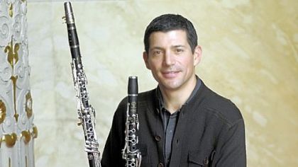 Michael Rusinek == Spectacular performance of Mozart on the obscure basset clarinet, which is the longer of the two clarinets he is holding.