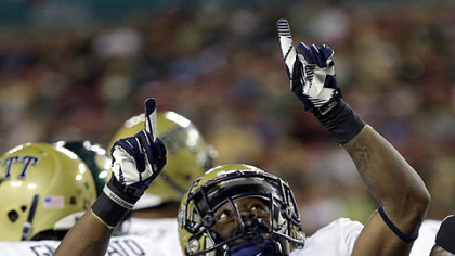 Pittsburgh running back Ray Graham celebrates after scoring on a one-yard touchdown run during the first quarter Saturday. The Panthers accept a bid to the BBVA Compass Bowl tonight.