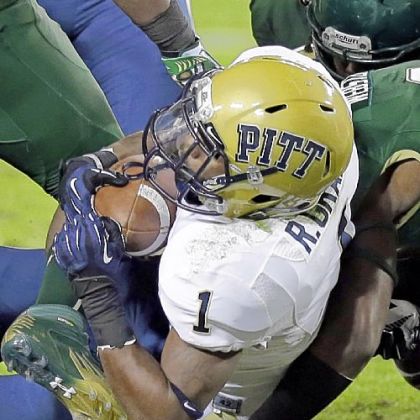 Ray Graham dives into the end zone to score Pitt's first touchdown Saturday night in what became a 27-3 win against South Florida in Tampa.