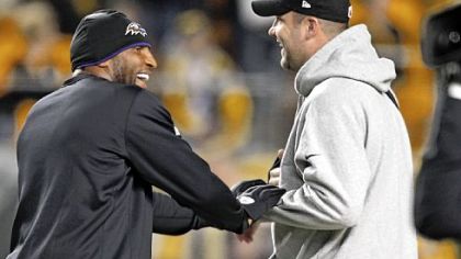 Injured veterans Ray Lewis, left, and Ben Roethlisberger meet before the game.