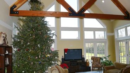 The family room in John and Mohylyn Yocca's house with a 15-foot Frazer fir.