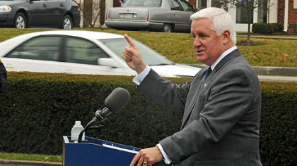 Gov. Tom Corbett talks at the ribbon-cutting ceremony at the reopening of Route 19, the Wexford Flats.