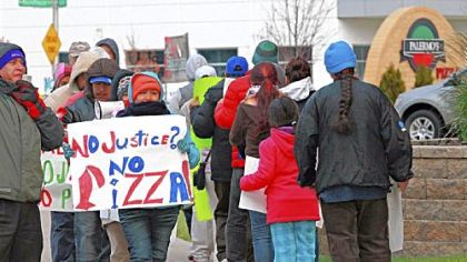 Protestors picket at Palermo's Pizza Nov. 17 in Milwaukee, Wis.