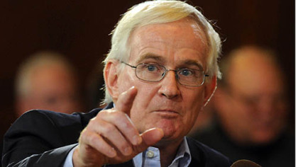 Former Pittsburgh Mayor Tom Murphy testifies  and motions to the proposed layout  and said  the Buncher Co.'s proposed Strip District project does not represent the kind of development that has marked Pittsburgh's transformation.