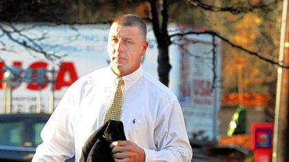 Suspended Whitaker police officer William S. Davis arrives for his preliminary hearing.