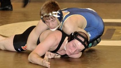 Norwin's Heath Coles, on top of Bethel Park's Dylan Mogan during a match last season, won a WPIAL championship at 145 pounds last season.