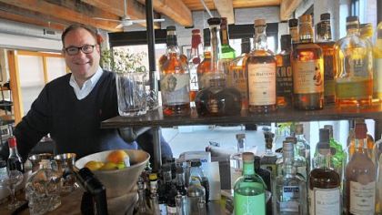 Dutch DeVries at the bar in his Strip District loft: "To me, cocktails are a lot like baking. It's a formula."