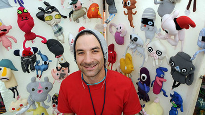 Daniel Baxter, creator of Kreepy Dolls, poses with his creations at the 2012Three Rivers Arts Festival.