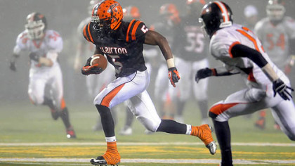 Clairton's Terrish Webb carries for a touchdown against Port Allegany in the PIAA semifinal Friday night.
