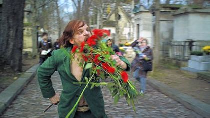 In "Holy Motors," Denis Lavant is brilliant in the various roles of Monsieur Oscar, including one in which he eats the flowers he has taken from headstones in a Paris cemetery.