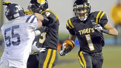 North Allegheny's Brendan Coniker carries back an interception against McDowell in the PIAA quarterfinals last Friday.
