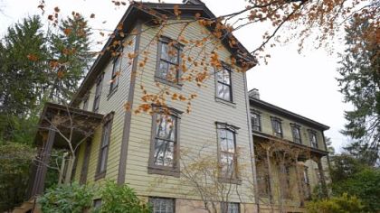 The wood-frame Victorian farmhouse is on the market for $589,000. The house has seven fireplaces, four bedrooms and 2 1/2 baths.