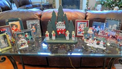 Christmas photos in the living room of Carol and Gerald Johnson's home.