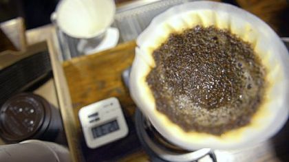 A cup of coffee brews by the pour-over method at 21st Street Coffee and Tea in the Strip District.