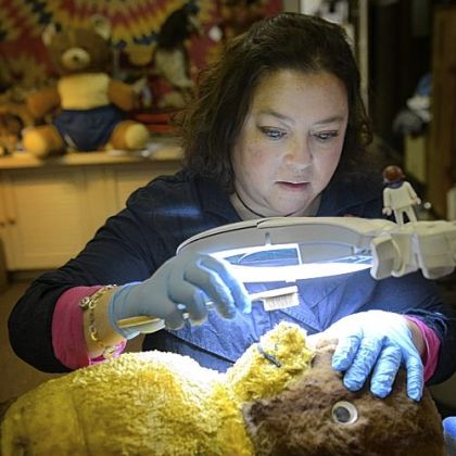 Jill DeBroff works on an older stuffed bear at the Teddy Bear Hospital of Pittsburgh in the back of her shop Babies & Bears at 4304 Butler St., Lawrenceville.