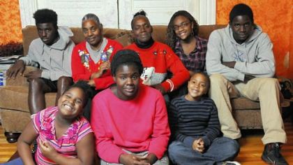 The Reese family at home, from left, front row: Taylor, 8; Clarisa, 18; Zachary, 7. On couch, from left: Henderson, 14; Joyce and Melanee; Cori, 14; and Donald, 16. Zachary and Cori are Joyce's grandchildren. Not pictured are Christopher and Jessica.