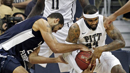 Pittsburgh's J.J. Moore steals the ball from North Florida's Andy Diaz in the first half.