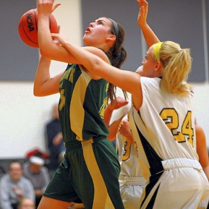 Blackhawk's Courtney Vannoy goes up for a shot against Montour's Taliah Banal.