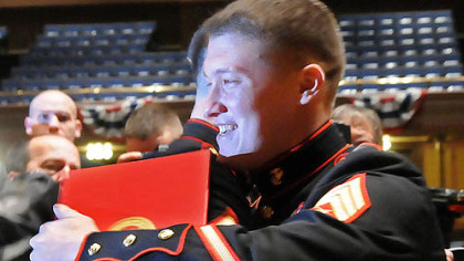 Marine Sgt. David M. Gerardi (right) gets congratulations from fellow Marines after receiving the Silver Star Medal for valor for action in Afghanistan.