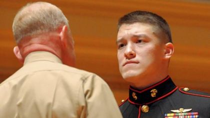 Maj. Gen. Melvin G. Spiese, left, congratulates Marine Sgt. David M. Gerardi after awarding him the Silver Star Medal for valor for action in Afghanistan during ceremonies at the Soldiers & Sailors Hall and Museum on Monday.
