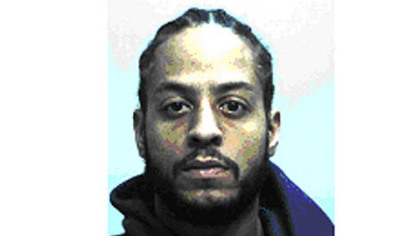 Homicide detectives determined that Lawrence Simmons and two other black males,  forced their way into the apartment and demanded money.