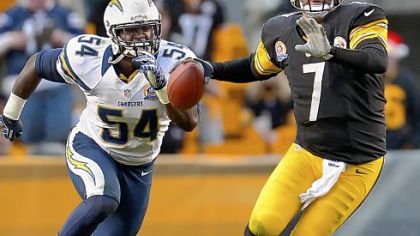 Steelers quarterback Ben Roethlisberger gets pressured by Chargers linebacker Melvin Ingram in Sunday's 34-24 loss.