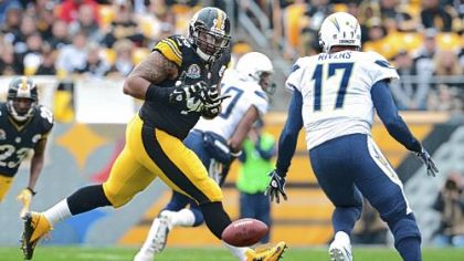 Ziggy Hood nearly intercepts a pass from Chargers quarterback Philip Rivers Sunday at Heinz Field.