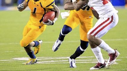 West Virginia's Tavon Austin's huge game against Oklahoma is a big reason for his selection to the Associated Press All-America first team.