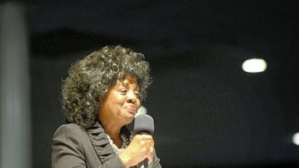 Newly inducted NAACP president Constance "Connie" Parker  addresses a crowd Tuesday night.