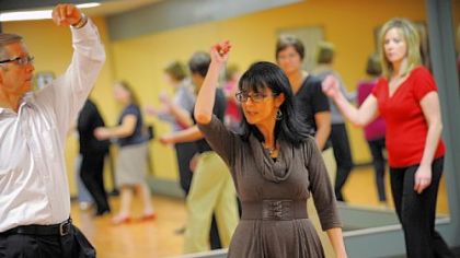 Joe and Luanne O'Brien demonstrate a dance technique during a class at Integral Ballroom Dance in Murrysville. Mrs. O'Brien teaches dance at the school, which she founded.