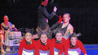 Rina Watanabe, left, Jenna Rae Smith, Jayme Wappel and Kelly Ramis as The Waiters support Laurel Bashore as The Sugar Rum Cherry in  Point Park University's Conservatory Dance Company production of "The Jazz Nutcracker."