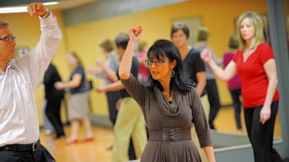 Joe and Luanne O'Brien demonstrate a dance technique during a class at Integral Ballroom Dance in Murrysville. Mrs. O'Brien teaches dance at the school, which she founded.
