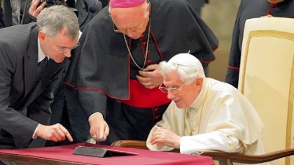Pope Benedict XVI is shown posting his first Twitter message Wednesday during his weekly general audience at the Vatican.