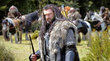 Richard Armitage as the Dwarf warrior Thorin Oakenshield and left, at the premiere of "The Hobbit."