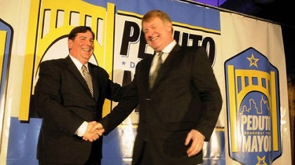 Pittsburgh Councilman Bill Peduto, left, as he announces his run for mayor, greets Allegheny County Executive Rich Fitzgerald at the Crucible Building in the Strip District on Thursday.