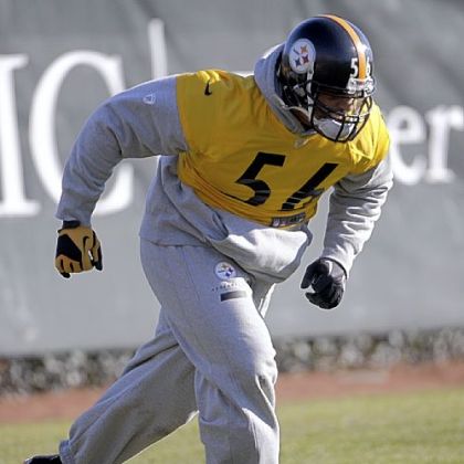 Linebacker LaMarr Woodley stretches Thursday at the team's South Side facility. Woodley thinks opposing quarterbacks have learned to throw the ball more quickly to avoid the Steelers rush.