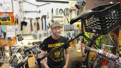 Nicholas Brungo, owner of Love Bikes, at his shop in an alleyway behind Arsenal Lanes in Lawrenceville, recently wrapped up a campaign to raise funds to start a new venture -- building bikes out of bamboo.