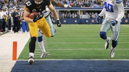 Heath Miller scores in the final seconds of the first half Sunday against the Cowboys at Cowboys Stadium in Arlington, Texas