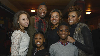Ryan and Yonka Clark with their children Jaden, Loghan and Jordan  Far right, Yonka's sister, Raquel Boyd