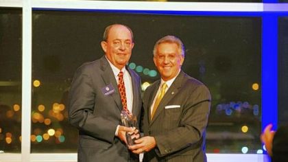 Honoree Norman Gottschalk  and RMU president Gregory G. Dell'Omo